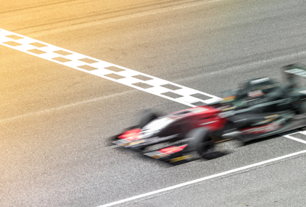 racecar crossing finish line
