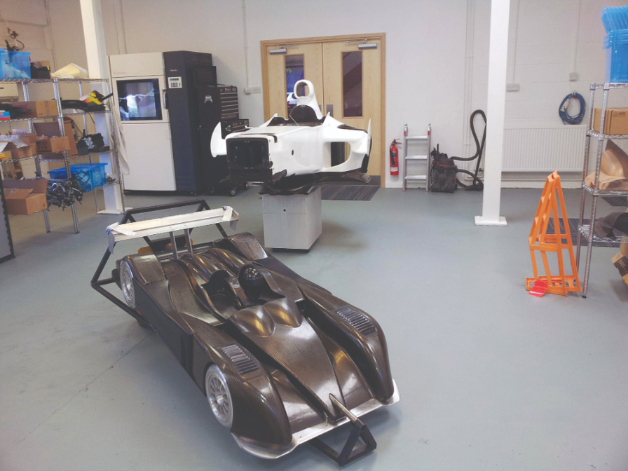 3d printed model of car in workshop