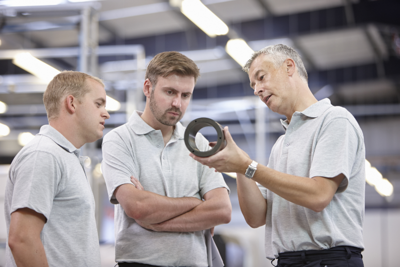 engineers with 3d prototype