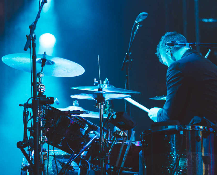 dan pawlovich performs on stage with a 3d printed snare drum