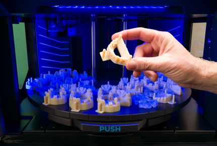 hand holding Bio tray model