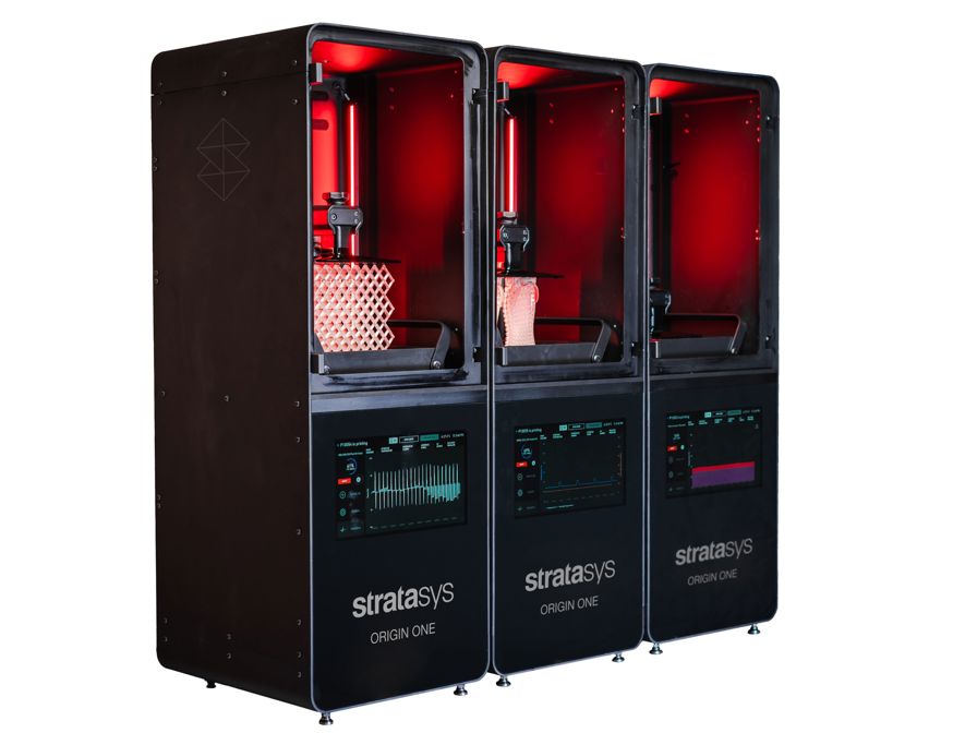 Three Origin One printers angled.