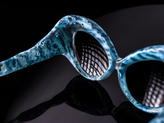 3d printed blue water inspired sunglasses. 3d printed blue water inspired sunglasses.