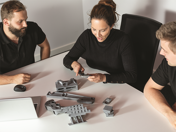 examining 3d printed prototypes.