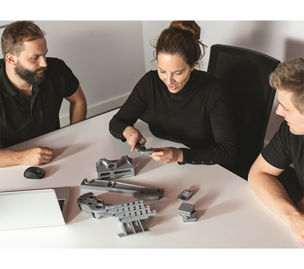 examining 3d printed prototypes.