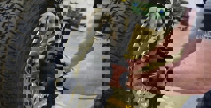 installing fixture on a car wheel.