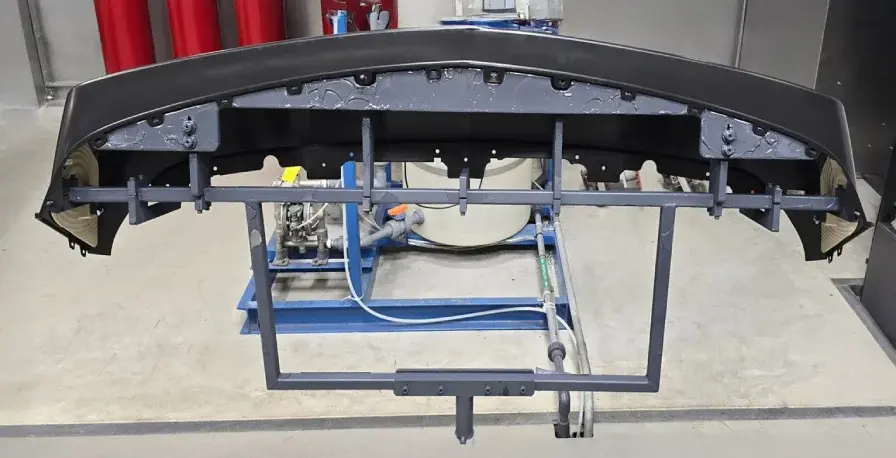 automotive bumper on paint line with 3d printed masking tool
