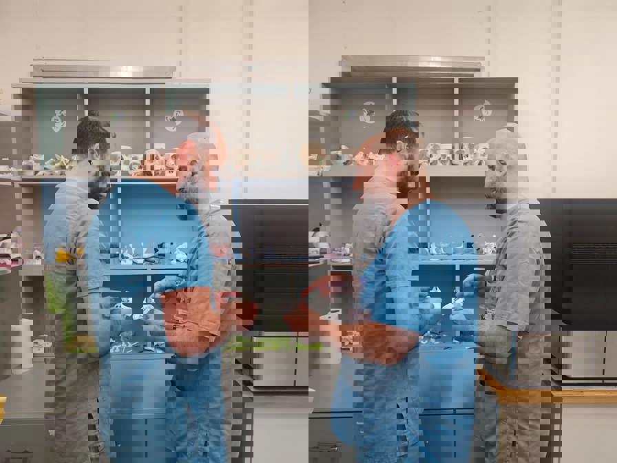 Srgeons reviewing craniomaxillofacial model 3D printed using Stratasys Polyjet Technology