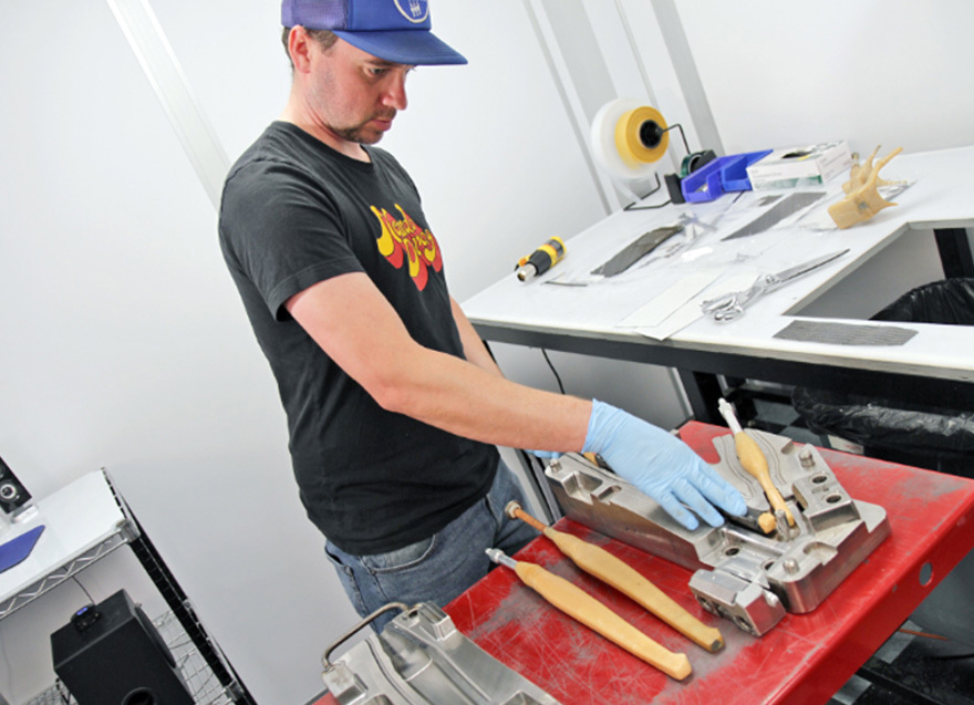 Test fitting a 3D printed ULTEM™ 1010 resin mandrel in the composite lay-up tool used to make the carbon fiber bike frame.