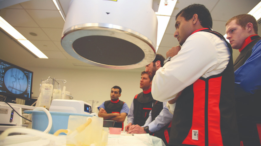 Second-year medical students in training using 3D printed vascular models.