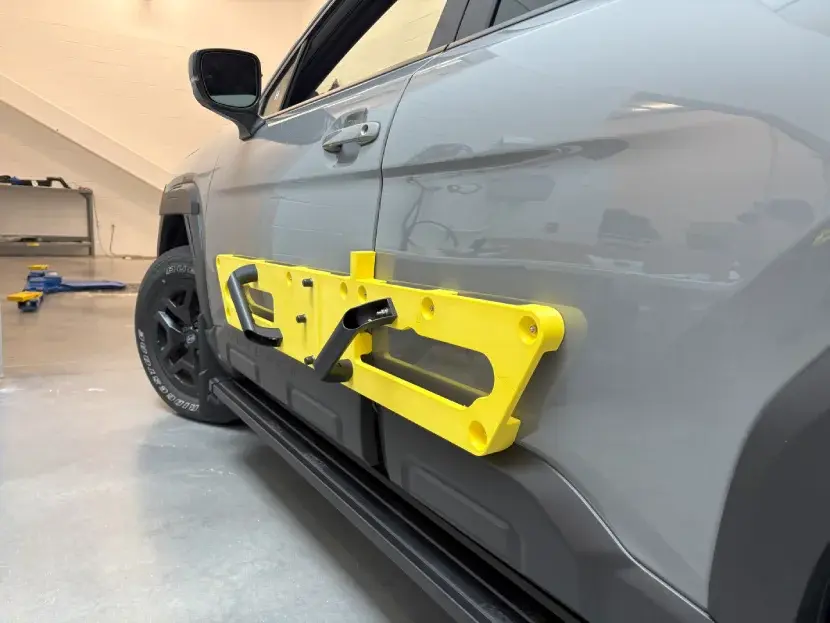 Stratasys FDM 3D printed mounting tool with magnets used by Subaru