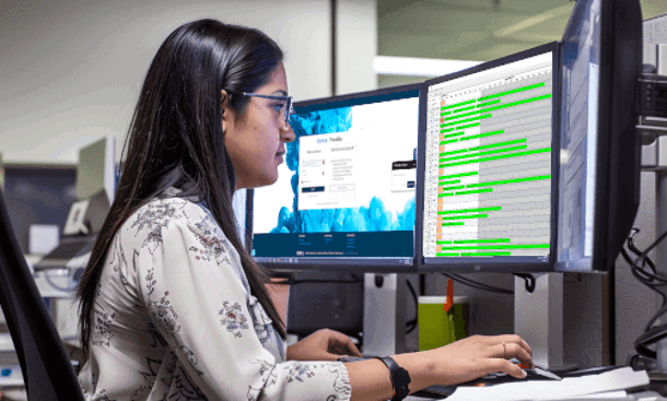 Woman scheduling 3d printed project Stratasys Direct