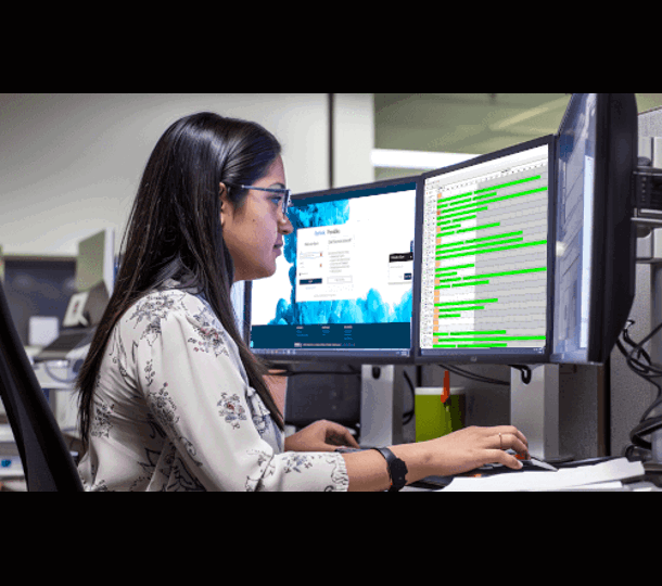 Woman scheduling 3d printed project Stratasys Direct
