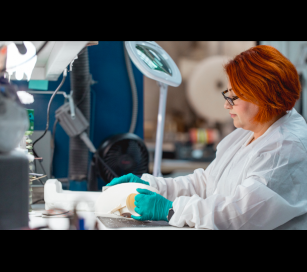 Woman finishing FDM 3d printed part Stratasys Direct